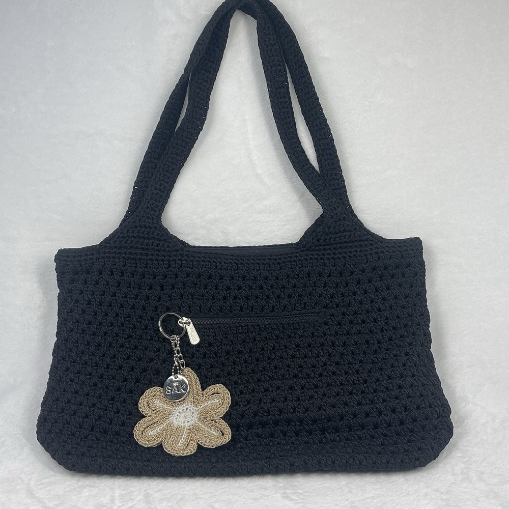 The Sak Black Crochet Shoulder Bag Boho Knit Purse Charm Flower NWOT